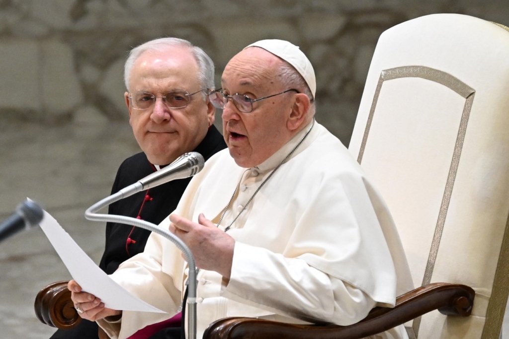 Vatican City (Vatican City State (holy See)), 10/01/2024.- Pope Francis (R), sitting next to Italian priest Monsignor Leonardo Sapienza, delivers an addres during his weekly general audience in the Paul VI Audience Hall, Vatican City, 10 January 2024. (Papa) EFE/EPA/MAURIZIO BRAMBATTI