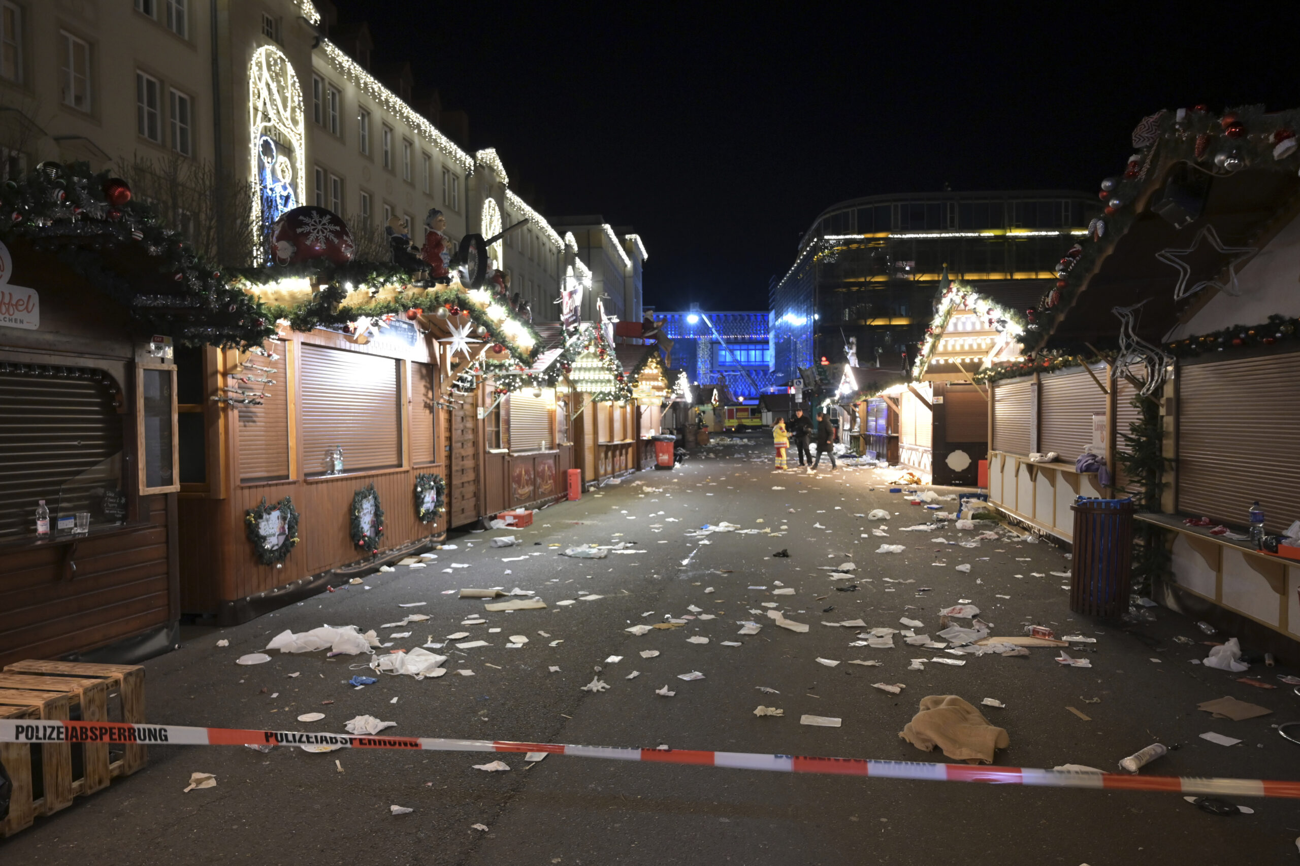 A view of the cordoned-off Christmas market after an incident in Magdeburg, Germany, Friday Dec. 20, 2024. (Heiko Rebsch/dpa via AP)